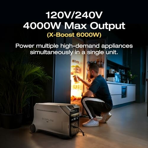 Man using portable power station in kitchen.